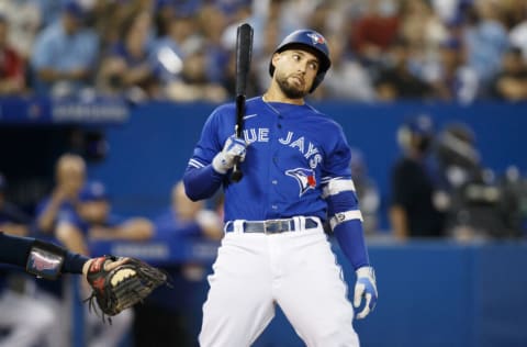 TORONTO, ON - SEPTEMBER 17: George Springer #4 of the Toronto Blue Jays reacts at the plate before grounding out in the seventh inning of their MLB game against the Minnesota Twins at Rogers Centre on September 17, 2021 in Toronto, Ontario. (Photo by Cole Burston/Getty Images)