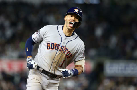 NEW YORK, NEW YORK - OCTOBER 17: Carlos Correa #1 of the Houston Astros celebrates his three-run home run against the New York Yankees during the sixth inning in game four of the American League Championship Series at Yankee Stadium on October 17, 2019 in New York City. Houston Astros defeated the New York Yankees 8-3. (Photo by Mike Stobe/Getty Images)