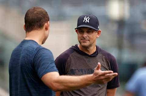 NEW YORK, NY - AUGUST 17: Aaron Boone #17 of the New York Yankees talks with Anthony Rizzo #48 of the New York Yankees before taking on the Boston Red Sox at Yankee Stadium on August 17, 2021 in New York City. (Photo by Adam Hunger/Getty Images)