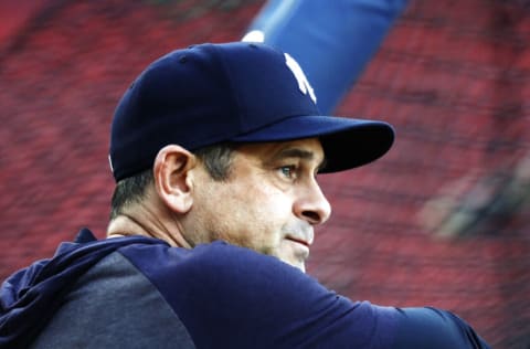 BOSTON, MASSACHUSETTS - SEPTEMBER 26: Manager Aaron Boone #17 of the New York Yankees looks on before the game between the Boston Red Sox and the New York Yankees at Fenway Park on September 26, 2021 in Boston, Massachusetts. (Photo by Omar Rawlings/Getty Images)