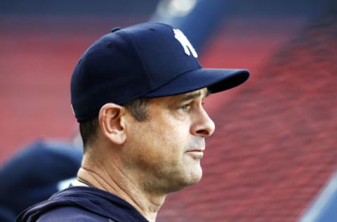 BOSTON, MASSACHUSETTS - SEPTEMBER 26: Manager Aaron Boone #17 of the New York Yankees looks on before the game between the Boston Red Sox and the New York Yankees at Fenway Park on September 26, 2021 in Boston, Massachusetts. (Photo by Omar Rawlings/Getty Images)