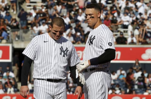 NEW YORK, NEW YORK - OCTOBER 02: Aaron Judge #99 (R) and Anthony Rizzo #48 of the New York Yankees look on after the fifth inning against the Tampa Bay Rays at Yankee Stadium on October 02, 2021 in New York City. The Rays defeated the Yankees 12-2. (Photo by Jim McIsaac/Getty Images)