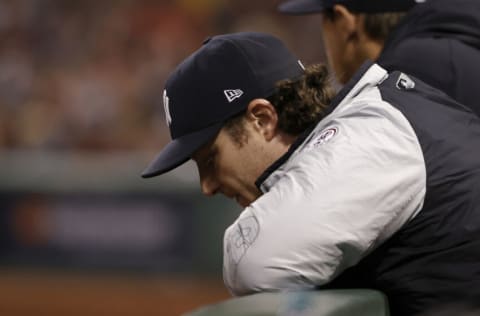 BOSTON, MASSACHUSETTS - OCTOBER 05: Gerrit Cole #45 of the New York Yankees looks on against the Boston Red Sox during the seventh inning of the American League Wild Card game at Fenway Park on October 05, 2021 in Boston, Massachusetts. (Photo by Winslow Townson/Getty Images)