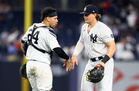 NEW YORK, NEW YORK - AUGUST 20: Luke Voit #59 of the New York Yankees celebrates with Gary Sanchez #24 after defeating the Minnesota Twins 10-2 at Yankee Stadium on August 20, 2021 in New York City. (Photo by Mike Stobe/Getty Images)