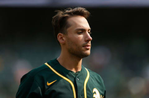 OAKLAND, CALIFORNIA - SEPTEMBER 25: Matt Olson #28 of the Oakland Athletics looks on between innings against the Houston Astros at RingCentral Coliseum on September 25, 2021 in Oakland, California. (Photo by Lachlan Cunningham/Getty Images)