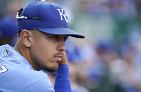 KANSAS CITY, MO - OCTOBER 3: Nicky Lopez #8 of the Kansas City Royals in watches from the dugout against the Minnesota Twins at Kauffman Stadium on October 3, 2021, in Kansas City, Missouri. (Photo by Ed Zurga/Getty Images)