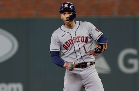 ATLANTA, GEORGIA - OCTOBER 31: Carlos Correa #1 of the Houston Astros celebrates after hitting an RBI double against the Atlanta Braves during the third inning in Game Five of the World Series at Truist Park on October 31, 2021 in Atlanta, Georgia. (Photo by Kevin C. Cox/Getty Images)