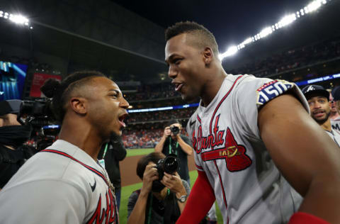 HOUSTON, TEXAS - NOVEMBER 02: Jorge Soler #12 and Ozzie Albies #1 of the Atlanta Braves celebrate their 7-0 victory against the Houston Astros in Game Six to win the 2021 World Series at Minute Maid Park on November 02, 2021 in Houston, Texas. (Photo by Carmen Mandato/Getty Images)