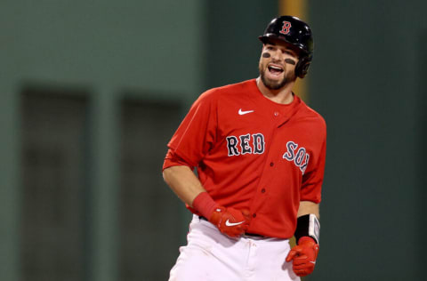 BOSTON, MASSACHUSETTS - OCTOBER 05: Kevin Plawecki #25 of the Boston Red Sox celebrates after hitting a double against the New York Yankees during the second inning of the American League Wild Card game at Fenway Park on October 05, 2021 in Boston, Massachusetts. (Photo by Maddie Meyer/Getty Images)