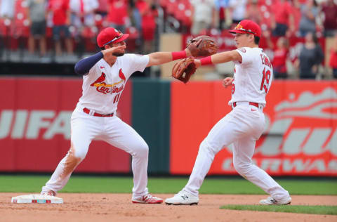 ST LOUIS, MO - SEPTEMBER 30: Paul DeJong #11 of the St. Louis Cardinals and Tommy Edman #19 of the St. Louis Cardinals celebrate after beating the Milwaukee Brewers at Busch Stadium on September 30, 2021 in St Louis, Missouri. (Photo by Dilip Vishwanat/Getty Images)