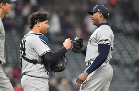 CLEVELAND, OHIO - APRIL 23: Catcher Gary Sanchez #24 celebrates with closing pitcher Aroldis Chapman #54 of the New York Yankees after the Yankees defeated the Cleveland Indians at Progressive Field on April 23, 2021 in Cleveland, Ohio. The Yankees defeated the Indians 5-3. (Photo by Jason Miller/Getty Images)