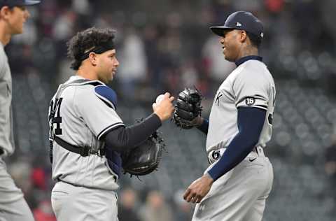 CLEVELAND, OHIO - APRIL 23: Catcher Gary Sanchez #24 celebrates with closing pitcher Aroldis Chapman #54 of the New York Yankees after the Yankees defeated the Cleveland Indians at Progressive Field on April 23, 2021 in Cleveland, Ohio. The Yankees defeated the Indians 5-3. (Photo by Jason Miller/Getty Images)