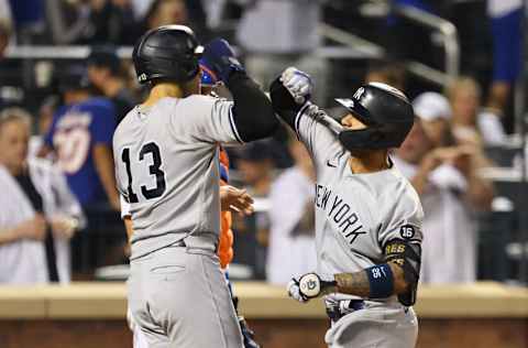 NEW YORK, NY - SEPTEMBER 12: Gleyber Torres #25 of the New York Yankees is congratulated by Joey Gallo #13 after he hit a two-run home run against the New York Mets during the sixth inning of a game at Citi Field on September 12, 2021 in New York City. (Photo by Rich Schultz/Getty Images)