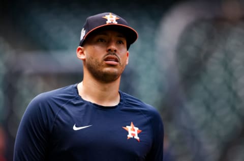 HOUSTON, TEXAS - OCTOBER 25: Carlos Correa #1 of the Houston Astros participates in a workout prior to the start of the World Series against the Atlanta Braves at Minute Maid Park on October 25, 2021 in Houston, Texas. (Photo by Carmen Mandato/Getty Images)