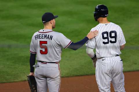 NEW YORK, NY - APRIL 20: Freddie Freeman #5 of the Atlanta Braves talks with Aaron Judge #99 of the New York Yankees during an MLB baseball game at Yankee Stadium on April 20, 2021 in New York City. The Yankees defeated the Braves 3-1. (Photo by Rich Schultz/Getty Images)