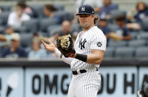 NEW YORK, NEW YORK - AUGUST 08: Luke Voit #59 of the New York Yankees reacts after a fielding error during the second inning against the Seattle Mariners at Yankee Stadium on August 08, 2021 in New York City. The Mariners defeated the Yankees 2-0. (Photo by Jim McIsaac/Getty Images)