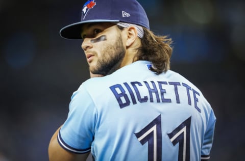 TORONTO, ONTARIO - OCTOBER 3: Bo Bichette #11 of the Toronto Blue Jays looks on in break against the Baltimore Orioles during their MLB game at the Rogers Centre on October 3, 2021 in Toronto, Ontario, Canada. (Photo by Mark Blinch/Getty Images)