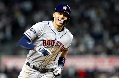 NEW YORK, NEW YORK - OCTOBER 17: Carlos Correa #1 of the Houston Astros celebrates his three-run home run against the New York Yankees during the sixth inning in game four of the American League Championship Series at Yankee Stadium on October 17, 2019 in New York City. (Photo by Mike Stobe/Getty Images)