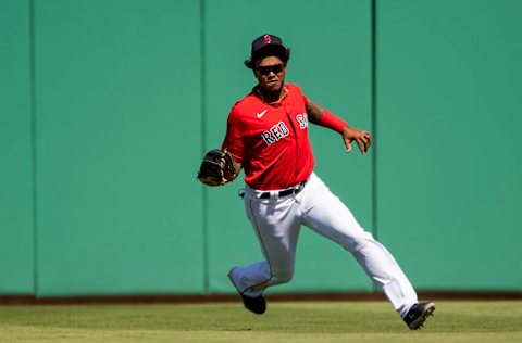 FT. MYERS, FL - FEBRUARY 28: Jeisson Rosario #66 of the Boston Red Sox fields a ball during the first inning of a Grapefruit League game against the Atlanta Braves at jetBlue Park at Fenway South on March 1, 2021 in Fort Myers, Florida. (Photo by Billie Weiss/Boston Red Sox/Getty Images)