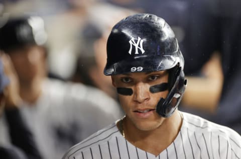 NEW YORK, NEW YORK - SEPTEMBER 21: Aaron Judge #99 of the New York Yankees looks on in the dugout during the seventh inning against the Texas Rangers at Yankee Stadium on September 21, 2021 in the Bronx borough of New York City. (Photo by Sarah Stier/Getty Images)