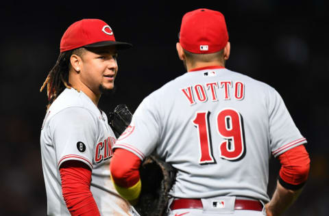 PITTSBURGH, PA - OCTOBER 01: Luis Castillo #58 talks with Joey Votto #19 of the Cincinnati Reds during the game against the Pittsburgh Pirates at PNC Park on October 1, 2021 in Pittsburgh, Pennsylvania. (Photo by Joe Sargent/Getty Images)