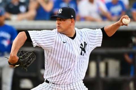 TAMPA, FLORIDA - MARCH 30: Manny Bañuelos #68 of the New York Yankees delivers a pitch to the Toronto Blue Jays in the first inning during a Grapefruit League spring training game at George Steinbrenner Field on March 30, 2022 in Tampa, Florida. (Photo by Julio Aguilar/Getty Images)