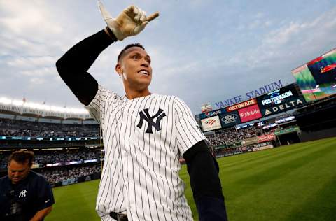 NEW YORK, NEW YORK - OCTOBER 03: Aaron Judge #99 of the New York Yankees celebrates after hitting a walk-off single in the bottom of the ninth inning to beat the Tampa Bay Rays, 1-0, clinching an American League Wild Card spot at Yankee Stadium on October 03, 2021 in New York City. (Photo by New York Yankees/Getty Images)