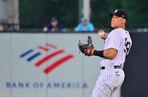 TAMPA, FLORIDA - MARCH 30: Aaron Judge #99 of the New York Yankees looks to throw the ball during a Grapefruit League spring training game against the Toronto Blue Jays at George Steinbrenner Field on March 30, 2022 in Tampa, Florida. (Photo by Julio Aguilar/Getty Images)