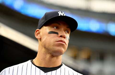 NEW YORK, NEW YORK - APRIL 11: Aaron Judge #99 of the New York Yankees stands in the dugout before the game against the Toronto Blue Jays at Yankee Stadium on April 11, 2022 in the Bronx borough of New York City. (Photo by Elsa/Getty Images)