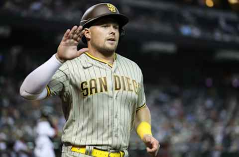 PHOENIX, ARIZONA - APRIL 09: Infielder Luke Voit #45 of the San Diego Padres runs back to the dugout after scoring during their MLB game against the Arizona Diamondbacks at Chase Field on April 09, 2022 in Phoenix, Arizona. The Padres won 5-2 against the Diamondbacks. (Photo by Rebecca Noble/Getty Images)