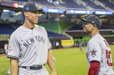 MIAMI, FL - JULY 10: Aaron Judge #99 of the New York Yankees talks with Mookie Betts #50 of the Boston Red Sox during Gatorade All-Star Workout Day at Marlins Park on July 10, 2017 in Miami, Florida. (Photo by Billie Weiss/Boston Red Sox/Getty Images)