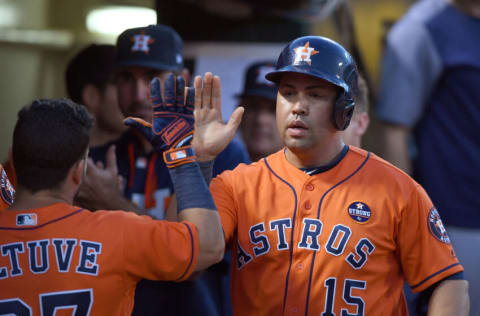 OAKLAND, CA - SEPTEMBER 09: Carlos Beltran #15 of the Houston Astros is congratulated by teammates after Beltran scored against the Oakland Athletics in the top of the seventh inning at Oakland Alameda Coliseum on September 9, 2017 in Oakland, California. (Photo by Thearon W. Henderson/Getty Images)