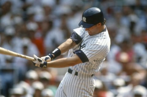 NEW YORK - CIRCA 1996: Paul O'Neill #21 of the New York Yankees bats during an Major League Baseball game circa 1996 at Yankee Stadium in the Bronx borough of New York City. O'Neill played for the Yankees from 1993-2001. (Photo by Focus on Sport/Getty Images)