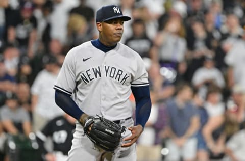 CHICAGO, ILLINOIS - MAY 14: Aroldis Chapman #54 of the New York Yankees reacts after giving up a single to the Chicago White Sox in the ninth inning at Guaranteed Rate Field on May 14, 2022 in Chicago, Illinois. (Photo by Quinn Harris/Getty Images)