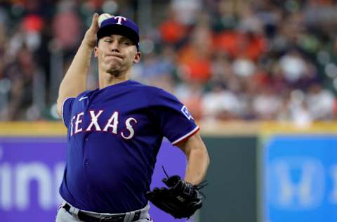 HOUSTON, TEXAS - MAY 19: Glenn Otto #49 of the Texas Rangers in action against the Houston Astros at Minute Maid Park on May 19, 2022 in Houston, Texas. (Photo by Carmen Mandato/Getty Images)