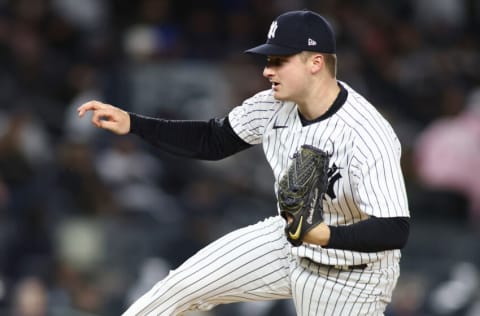 NEW YORK, NEW YORK - APRIL 10: Clarke Schmidt #86 of the New York Yankees in action against the Boston Red Sox at Yankee Stadium on April 10, 2022 in New York City. Boston Red Sox defeated the New York Yankees 4-3. (Photo by Mike Stobe/Getty Images)