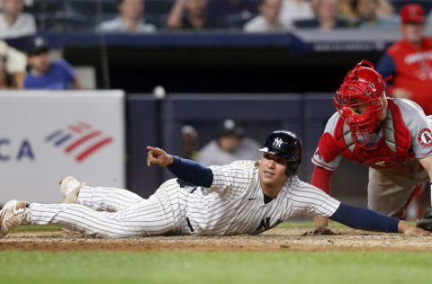 NEW YORK, NEW YORK - MAY 31: (NEW YORK DAILIES OUT) Jose Trevino #39 of the New York Yankees in action against Max Stassi #33 of the Los Angeles Angels at Yankee Stadium on May 31, 2022 in New York City. The Yankees defeated the Angels 9-1. (Photo by Jim McIsaac/Getty Images)