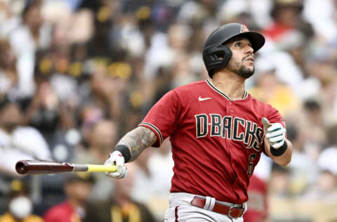 SAN DIEGO, CA - JUNE 17: David Peralta #6 of the Arizona Diamondbacks watches the flight of his solo home run during the sixth inning of a baseball game against the San Diego Padres July 17, 2022 at Petco Park in San Diego, California. (Photo by Denis Poroy/Getty Images)