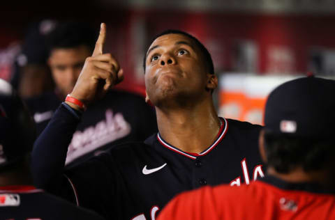 PHOENIX, AZ - JULY 22: Juan Soto #22 of the Washington Nationals gestures in the dugout before the MLB game against the Arizona Diamondbacks at Chase Field on July 22, 2022 in Phoenix, Arizona. (Photo by Mike Christy/Getty Images)