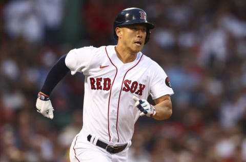 BOSTON, MA - JULY 08: Rob Refsnyder #30 of the Boston Red Sox hits a single in the second inning of a game against the New York Yankees at Fenway Park on July 8, 2022 in Boston, Massachusetts. (Photo by Adam Glanzman/Getty Images)