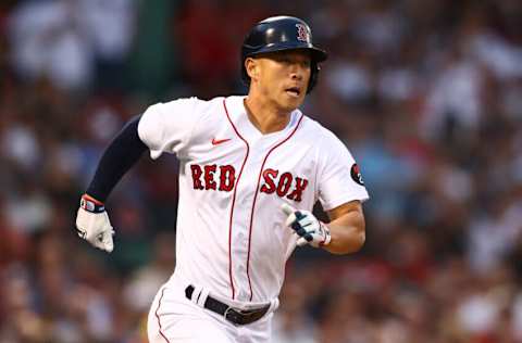 BOSTON, MA - JULY 08: Rob Refsnyder #30 of the Boston Red Sox hits a single in the second inning of a game against the New York Yankees at Fenway Park on July 8, 2022 in Boston, Massachusetts. (Photo by Adam Glanzman/Getty Images)