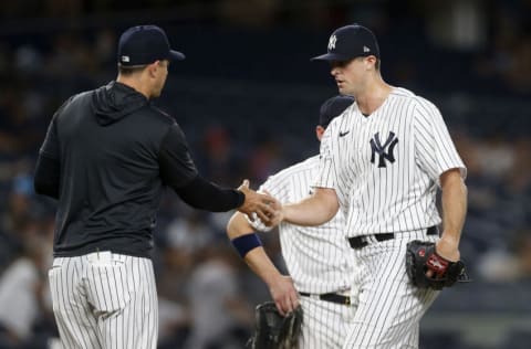 NEW YORK, NEW YORK - JULY 12: Clay Holmes #35 of the New York Yankees is taken out of the game by manager Aaron Boone in the ninth inning at Yankee Stadium on July 12, 2022 in New York City. (Photo by Jim McIsaac/Getty Images)