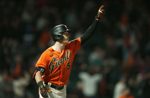 SAN FRANCISCO, CALIFORNIA - JULY 15: Mike Yastrzemski #5 of the San Francisco Giants celebrates after hitting a walk-off grand slam in the bottom of the ninth inning against the Milwaukee Brewers at Oracle Park on July 15, 2022 in San Francisco, California. (Photo by Lachlan Cunningham/Getty Images)