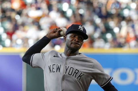 HOUSTON, TEXAS - JULY 21: Domingo German #55 of the New York Yankees pitches in the first inning against the Houston Astros during game two of a doubleheader at Minute Maid Park on July 21, 2022 in Houston, Texas. (Photo by Bob Levey/Getty Images)