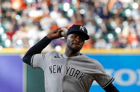 HOUSTON, TEXAS - JULY 21: Domingo German #55 of the New York Yankees pitches in the first inning against the Houston Astros during game two of a doubleheader at Minute Maid Park on July 21, 2022 in Houston, Texas. (Photo by Bob Levey/Getty Images)