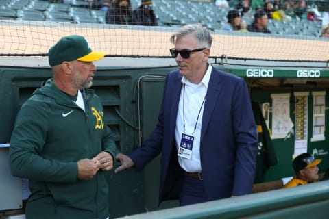 Third Base Coach Mark Kotsay #7 and Executive Vice President of Baseball Operations Billy Beane of the Oakland Athletics (Photo by Michael Zagaris/Oakland Athletics/Getty Images)