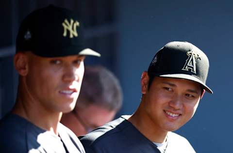 LOS ANGELES, CALIFORNIA - JULY 19: Aaron Judge #99 of the New York Yankees and Shohei Ohtani #17 of the Los Angeles Angels look on from the dugout before the 92nd MLB All-Star Game presented by Mastercard at Dodger Stadium on July 19, 2022 in Los Angeles, California. (Photo by Ronald Martinez/Getty Images)