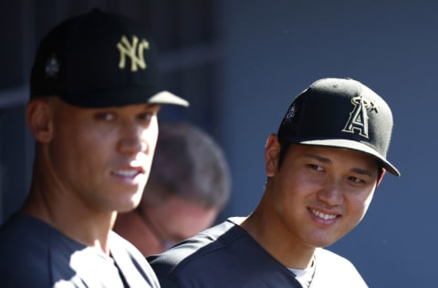 LOS ANGELES, CALIFORNIA - JULY 19: Aaron Judge #99 of the New York Yankees and Shohei Ohtani #17 of the Los Angeles Angels look on from the dugout before the 92nd MLB All-Star Game presented by Mastercard at Dodger Stadium on July 19, 2022 in Los Angeles, California. (Photo by Ronald Martinez/Getty Images)