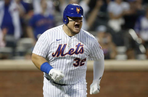 NEW YORK, NEW YORK - AUGUST 04: Daniel Vogelbach #32 of the New York Mets in action against the Atlanta Braves at Citi Field on August 04, 2022 in New York City. The Mets defeated the Braves 6-4. (Photo by Jim McIsaac/Getty Images)