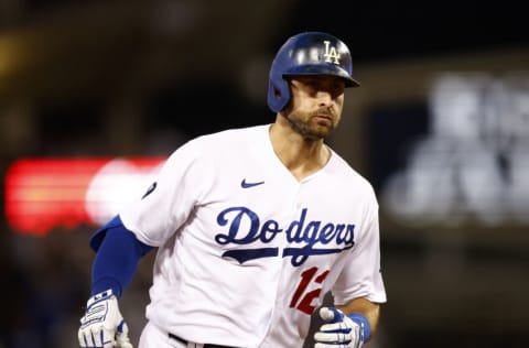 LOS ANGELES, CALIFORNIA - AUGUST 10: Joey Gallo #12 of the Los Angeles Dodgers runs after hitting a three-run home run against the Minnesota Twins in the seventh inning at Dodger Stadium on August 10, 2022 in Los Angeles, California. (Photo by Ronald Martinez/Getty Images)